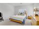 Cozy bedroom with large windows, bright atmosphere, and minimal decor at 7255 Bold Rock Ave, Las Vegas, NV 89113