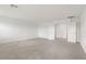 Spacious carpeted bedroom with neutral walls and ample natural light at 7255 Bold Rock Ave, Las Vegas, NV 89113