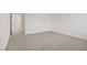 Spacious bedroom with neutral carpet and ample natural light, creating a warm and inviting ambiance at 7255 Bold Rock Ave, Las Vegas, NV 89113