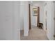 Well-lit hallway with clean lines, offering access to different areas of the home at 7255 Bold Rock Ave, Las Vegas, NV 89113
