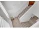 Bright staircase with modern design and neutral carpeting at 7255 Bold Rock Ave, Las Vegas, NV 89113