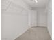 Walk-in closet with wire shelving, neutral walls, and carpet flooring at 7255 Bold Rock Ave, Las Vegas, NV 89113