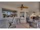 Spacious covered patio with comfortable seating, ideal for enjoying the outdoors in any weather at 7333 Painted Shadows Way, Las Vegas, NV 89149