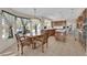 Eat in kitchen featuring wood cabinetry and views out to the pool at 7333 Painted Shadows Way, Las Vegas, NV 89149