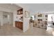 Spacious open living space with a bar area, and fireplace at 7333 Painted Shadows Way, Las Vegas, NV 89149