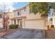 Charming home with a two-car garage, well-maintained landscaping, and inviting curb appeal at 7925 Limbwood Ct, Las Vegas, NV 89131