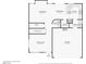 Main floor plan with living and dining room, kitchen, laundry room, and garage at 7925 Limbwood Ct, Las Vegas, NV 89131