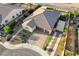 Bird's eye view of a well-kept house featuring an extended driveway and drought-resistant landscaping at 8298 W Agate Ave, Las Vegas, NV 89113
