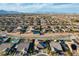 Wide aerial view of a suburban neighborhood showcasing uniform homes and community layout at 8298 W Agate Ave, Las Vegas, NV 89113