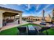 Resort-style backyard featuring a pool, spa, and lounge area, perfect for outdoor entertaining at 8298 W Agate Ave, Las Vegas, NV 89113