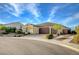 Well-maintained single-story home with a desert landscape, a three-car garage, and a neatly paved driveway at 8298 W Agate Ave, Las Vegas, NV 89113