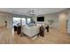 Contemporary living area featuring sleek floors, modern furnishings and access to a patio at 8298 W Agate Ave, Las Vegas, NV 89113