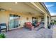 Inviting outdoor patio with comfortable seating, ideal for entertaining or relaxing by the pool at 8298 W Agate Ave, Las Vegas, NV 89113