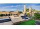 Luxury backyard oasis with a custom pool, spa, and elegant patio area, perfect for relaxation at 8298 W Agate Ave, Las Vegas, NV 89113