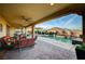 Beautiful pool area with a covered patio, comfortable seating, and scenic views at 8298 W Agate Ave, Las Vegas, NV 89113