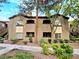Attractive two-story condo with beautiful landscaping, sidewalk, and mature trees at 9000 S Las Vegas Blvd # 1187, Las Vegas, NV 89123