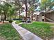 Exterior shot of well-maintained community grounds with mature landscaping, walkways and covered gazebo at 9000 S Las Vegas Blvd # 1187, Las Vegas, NV 89123