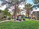 Exterior view of community gazebo, with well-manicured lawns, mature trees and walkways at 9000 S Las Vegas Blvd # 1187, Las Vegas, NV 89123