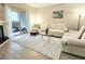 Inviting living room with fireplace, sliding glass doors, and comfortable seating at 9000 S Las Vegas Blvd # 1187, Las Vegas, NV 89123