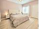 Comfortable bedroom with a large bed, neutral colors, and natural light at 9000 S Las Vegas Blvd # 1187, Las Vegas, NV 89123