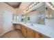 Bathroom with double sinks, large mirrors, and ample counter space at 914 Calico Brook Dr, Henderson, NV 89002