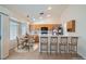Bright kitchen with a breakfast bar, stainless steel appliances and a breakfast nook perfect for casual dining at 914 Calico Brook Dr, Henderson, NV 89002