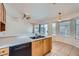 Bright kitchen with stainless steel double sink and seating at the breakfast nook at 914 Calico Brook Dr, Henderson, NV 89002