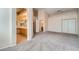 Spacious main bedroom with neutral carpeting, closet, and ensuite bathroom access at 914 Calico Brook Dr, Henderson, NV 89002