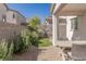 Charming backyard design featuring a patio and desert landscaping, creating a private outdoor retreat at 9233 Far Side Ave, Las Vegas, NV 89143