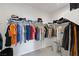 Spacious walk-in closet with shelving and clothing racks at 9233 Far Side Ave, Las Vegas, NV 89143