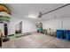 A spacious garage with storage and workout equipment; the room offers versatile functionality at 9233 Far Side Ave, Las Vegas, NV 89143