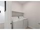 Laundry room with modern washing machine and dryer at 9233 Far Side Ave, Las Vegas, NV 89143