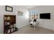 Bright office with a large window, shutters, and a bookcase at 9233 Far Side Ave, Las Vegas, NV 89143