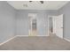 A large bedroom with a connected bathroom and closets at 965 Nevada State Dr # 36102, Henderson, NV 89002