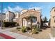 Charming two-story home with stone accents, desert landscaping, and an attached garage at 10435 Meadow Village St, Las Vegas, NV 89183