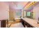 Spacious bathroom featuring double sinks, a tub with glass block window and a walk in shower at 138 Wentworth Dr, Henderson, NV 89074
