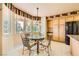Eat-in kitchen breakfast nook surrounded by large windows at 138 Wentworth Dr, Henderson, NV 89074