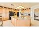 Spacious kitchen featuring a center island with breakfast bar and ample counter space at 138 Wentworth Dr, Henderson, NV 89074