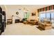 Inviting living room features plush seating, fireplace, and views of the outdoor scenery at 138 Wentworth Dr, Henderson, NV 89074