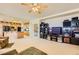 Spacious living area adjacent to the kitchen, featuring media center and comfortable seating at 138 Wentworth Dr, Henderson, NV 89074