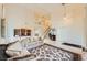 Open concept living room featuring soaring ceilings, tile floors, and a staircase leading to the second floor at 138 Wentworth Dr, Henderson, NV 89074
