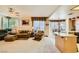 Comfortable living space with plush furnishings, natural light, and view to the outdoors at 138 Wentworth Dr, Henderson, NV 89074
