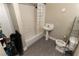 Cozy bathroom featuring a shower-tub combo and a pedestal sink at 1467 Hialeah Dr # D, Las Vegas, NV 89119