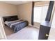 Comfortable bedroom with a window and a wardrobe at 1467 Hialeah Dr # D, Las Vegas, NV 89119