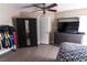 Bright bedroom with a closet, television, and a neutral color scheme at 1467 Hialeah Dr # D, Las Vegas, NV 89119