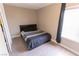 Minimalist bedroom with neutral walls and comfortable bed at 1467 Hialeah Dr # D, Las Vegas, NV 89119