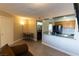 Living room is connected to the kitchen space that features a pass through at 1467 Hialeah Dr # D, Las Vegas, NV 89119