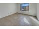 Bright bedroom with tile floors and a large window providing natural light at 1575 W Warm Springs Rd # 1111, Henderson, NV 89014