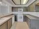 Efficient kitchen features sleek countertops, bright white appliances, and ample cabinet space for all your culinary needs at 1575 W Warm Springs Rd # 1111, Henderson, NV 89014