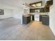 Well-lit kitchen featuring modern appliances, breakfast bar, and open layout at 1575 W Warm Springs Rd # 1111, Henderson, NV 89014